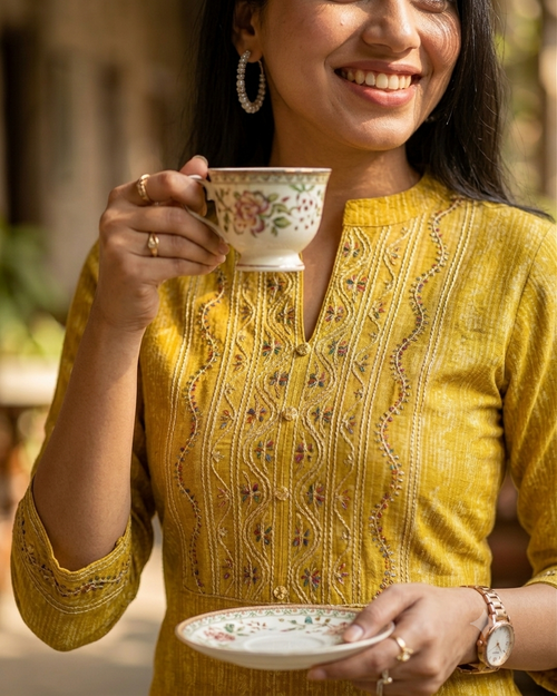 Trendy Fashionable Yellow Cotton Embroidered Kurti